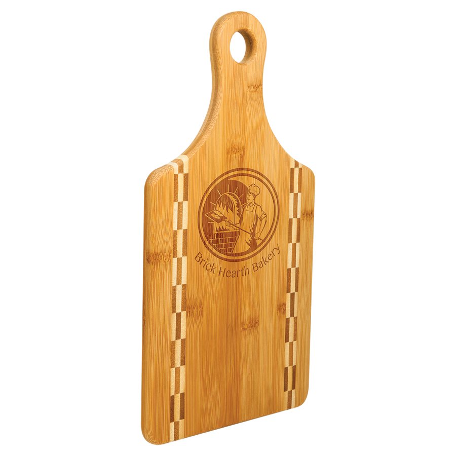 Customize this 13 1/2" x 7" Paddle Shaped Bamboo Cutting Board with Butcher Block Inlay with your company logo or personal saying.